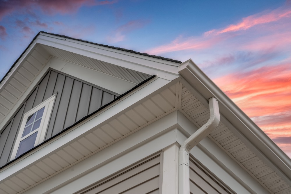 Roofline against colorful sky