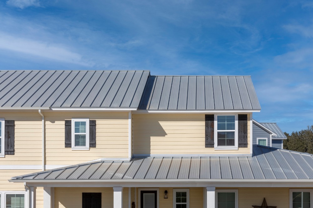 Yellow house with metal roof